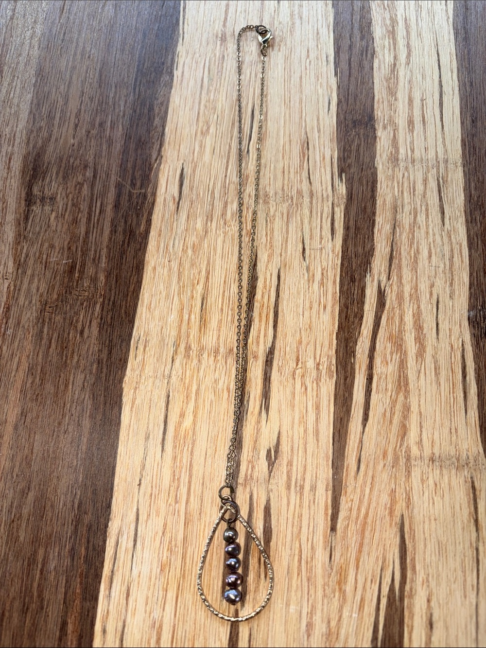 Delicate Gold Teardrop Necklace with Dark Pearls